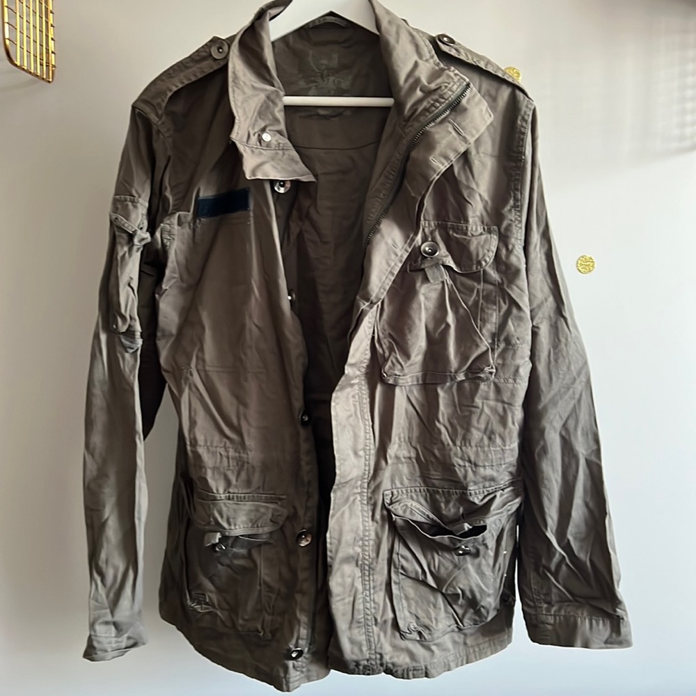 Size medium olive green N-65 field utility jacket